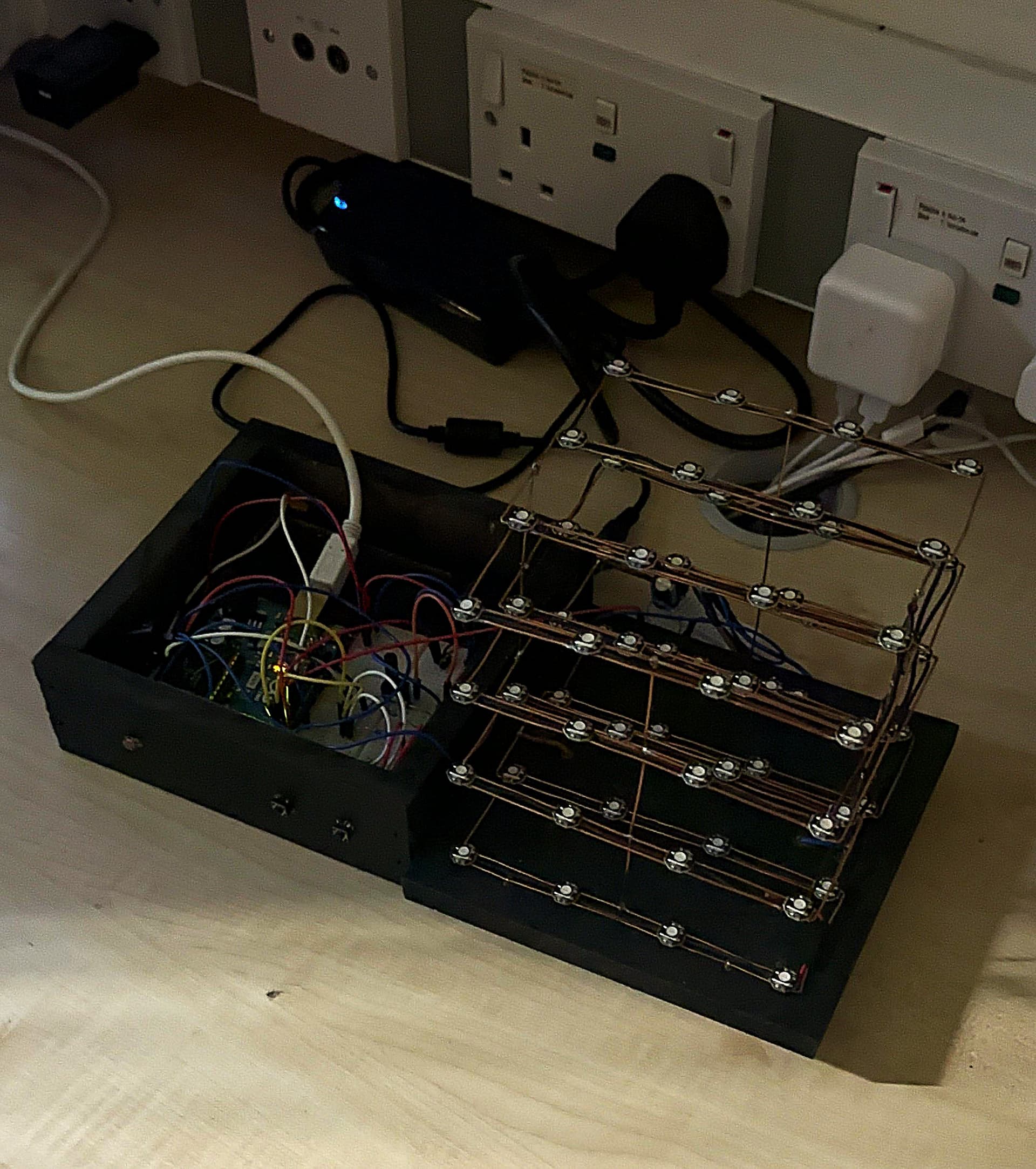 4x4x4 NeoPixel LED Cube showing an active animation
